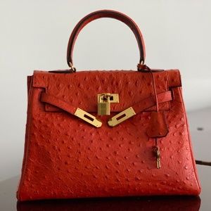 Authentic Vintage Hermes Ostrich Retourne Kelly 28 - Rouge with Gold hardware